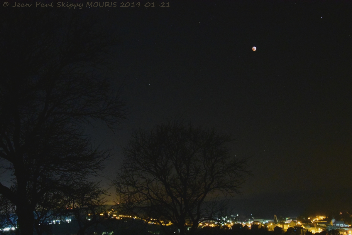 Panorama of Roodt-sur-Syre with the eclipsed moon